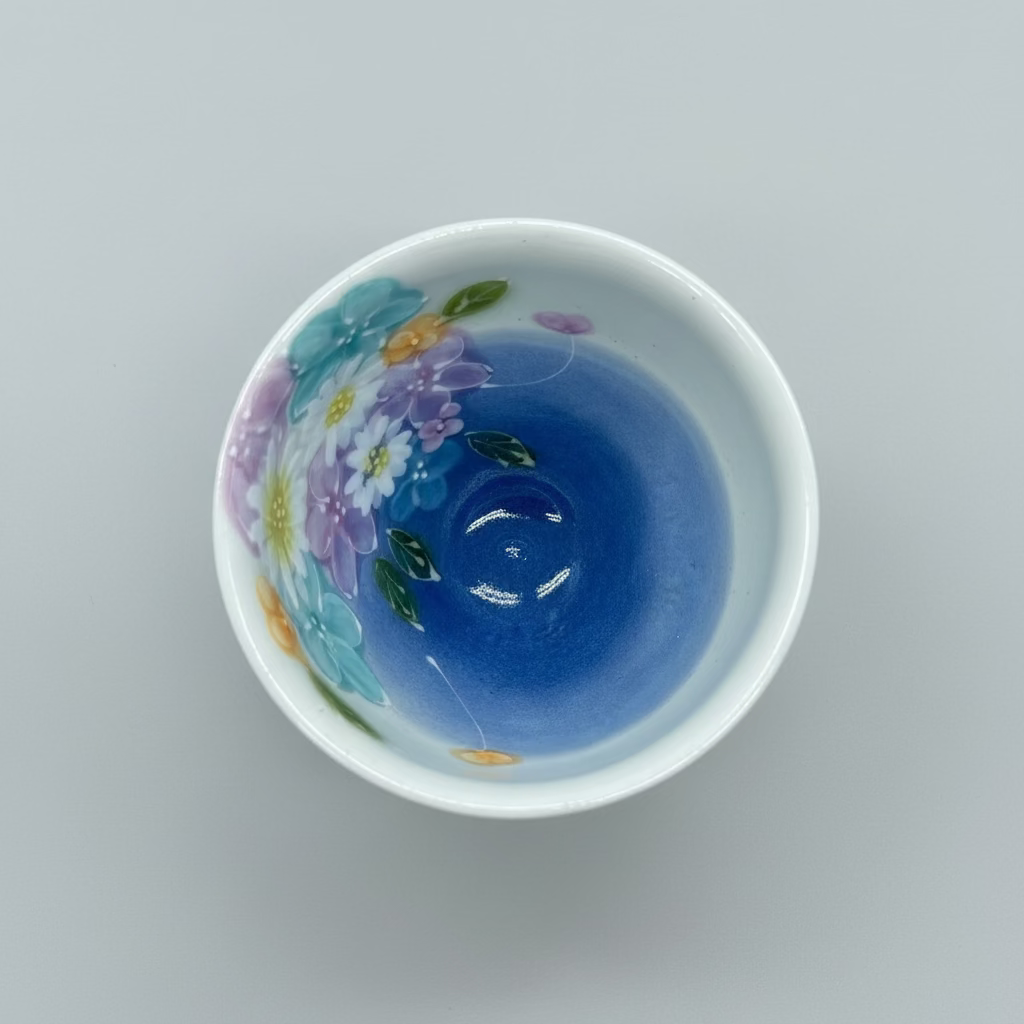 Yuzuriha Studio: Handmade Yunomi Cup - Handwritten floral pattern - Blue front view yunomi.life