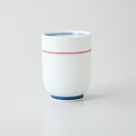 Saikai Ceramics: Red Trim, White Porcelain Yunomi Tea Cup with Blue Accents 150 ml - Yunomi.life